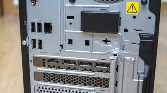 Close-up view of the rear ports on the Lenovo LOQ Tower 17, including four USB ports and RJ45 Ethernet, as well as three DisplayPort ports and one HDMI port on the GPU