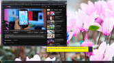 Screenshot of Windows 11 displaying live captions with large blue text on yellow background