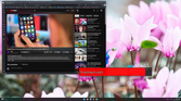 Screenshot of Windows 11 displaying live captions with extra large light blue text on red background