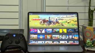 Nvidia GeForce Now Ultimate running on a laptop next to an xbox controller