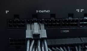 An image showing a PCIe cable being connected to the PSU.