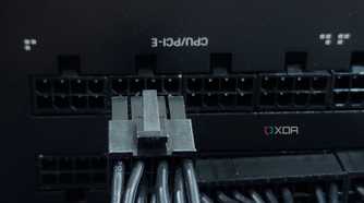 An image showing a PCIe cable being connected to the PSU.