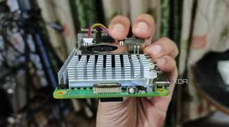 An image of the Raspberry Pi 5 with the power button and PCIe interface visible