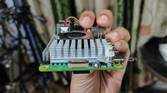 An image of the Raspberry Pi 5 with the power button and PCIe interface visible