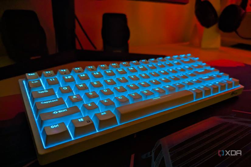 RK84 white keyboard with blue backlight on a desk