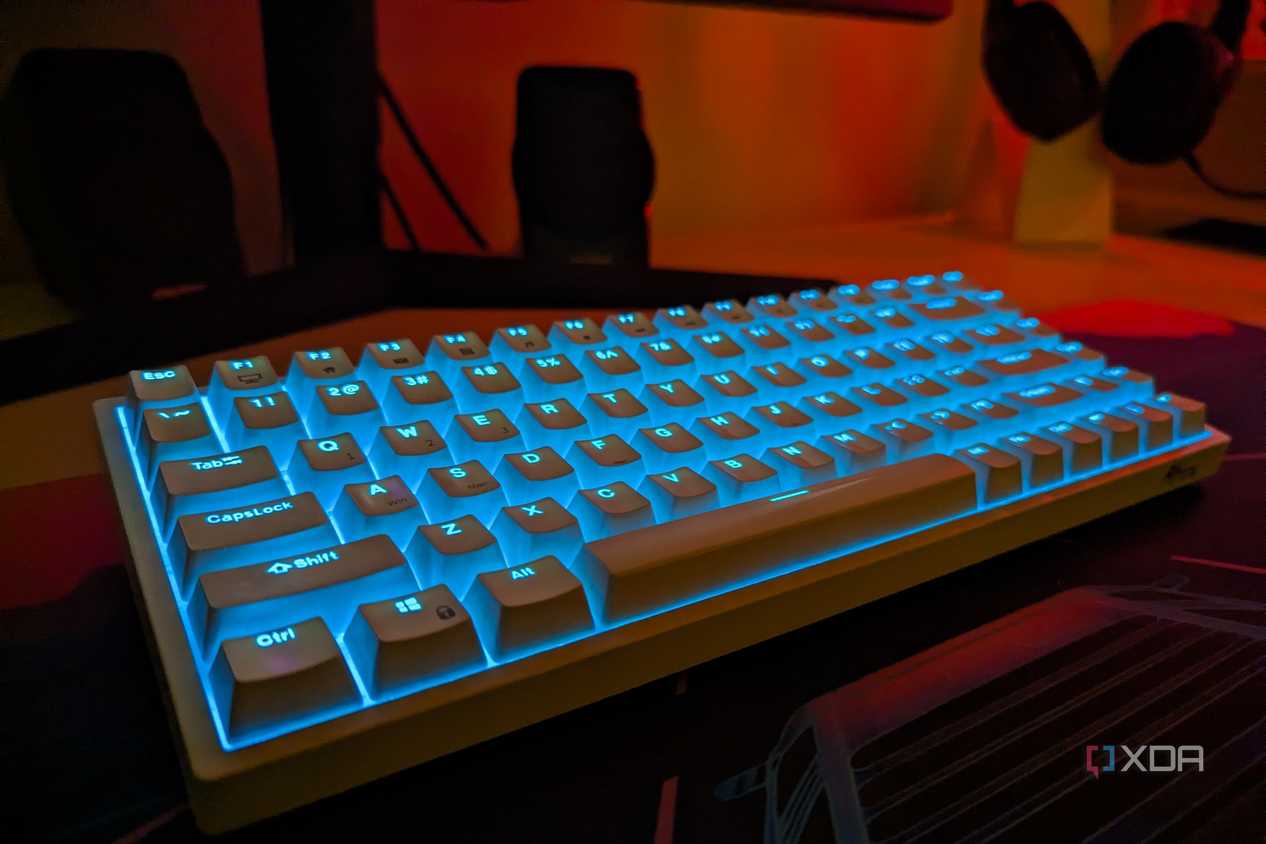 RK84 white keyboard with blue backlight on a desk