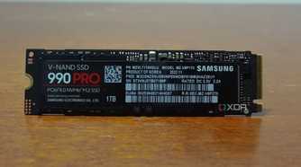An image showing a Samsung 990 Pro SSD on a desk.