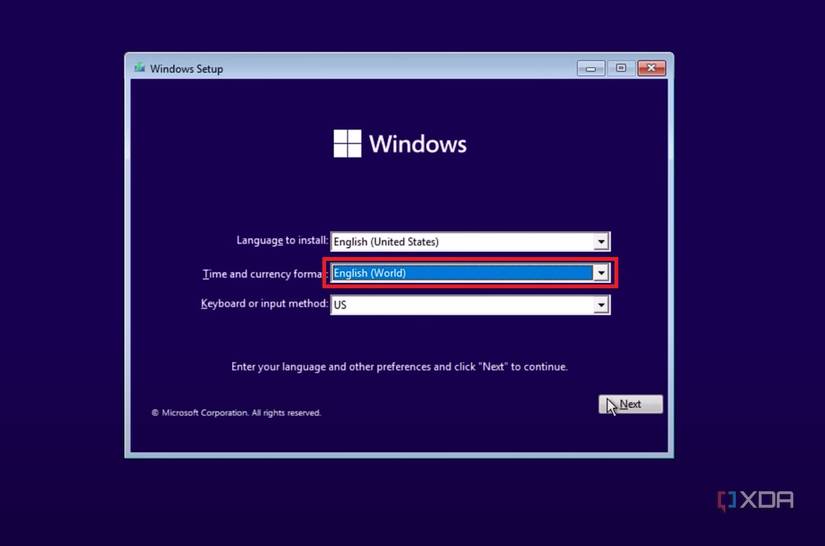 Screenshot of Windows 11 Setup with Time and currency format set to English (World)
