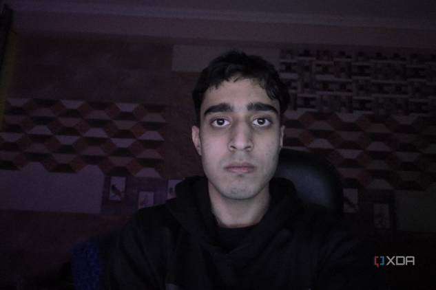 An image of a man sitting in front of the OBSBOT Tail Air webcam