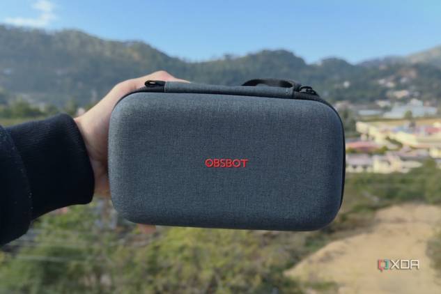 A person holding an OBSBOT Tail Air case