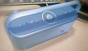 Soundcore Motion X600 in Lunar Blue with Black Les Paul guitar in background
