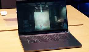 A Space Black MacBook Pro running a game.