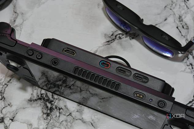 An image showing the Steam Deck placed next to Viture One smart glasses.