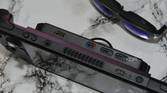 An image showing the Steam Deck placed next to Viture One smart glasses.