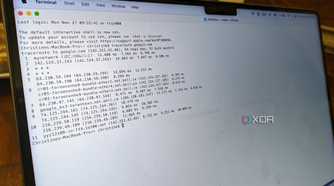 A sideview of a MacBook Pro showing the Terminal app running a traceroute.