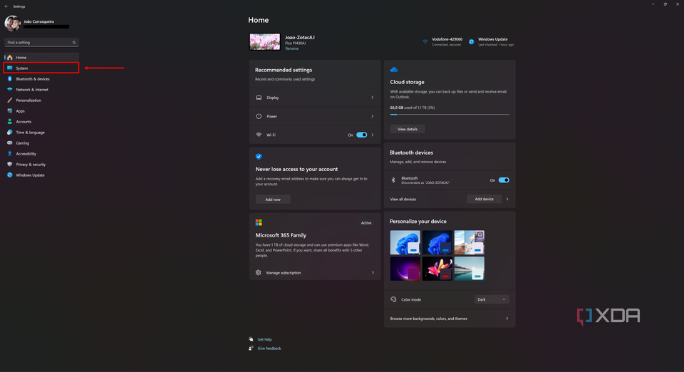 Screenshot of Windows 11 Settings home page with the System section highlighted in the left-side menu