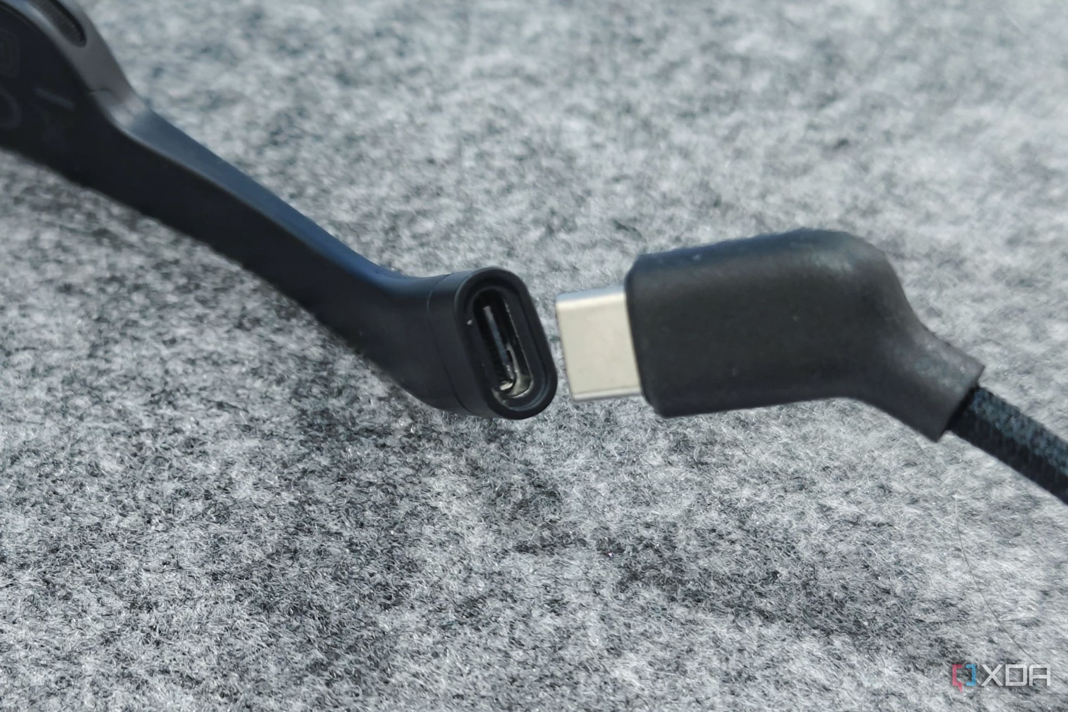 An image showing the XREAL Air 2 USB-C port next to an angled connector.