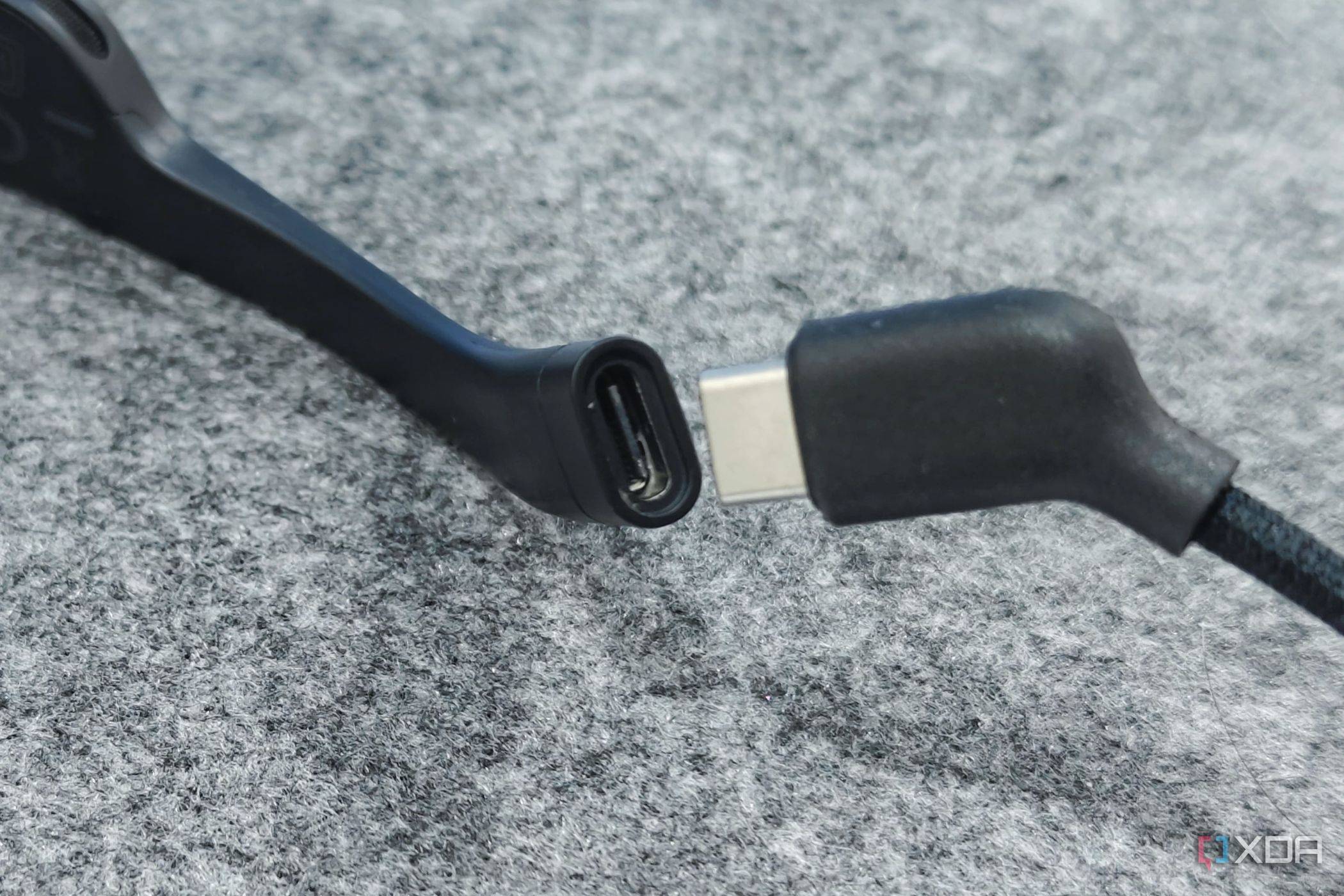An image showing the XREAL Air 2 USB-C port next to an angled connector.