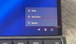 A photo of the restart button in Windows 11 showing the restart button