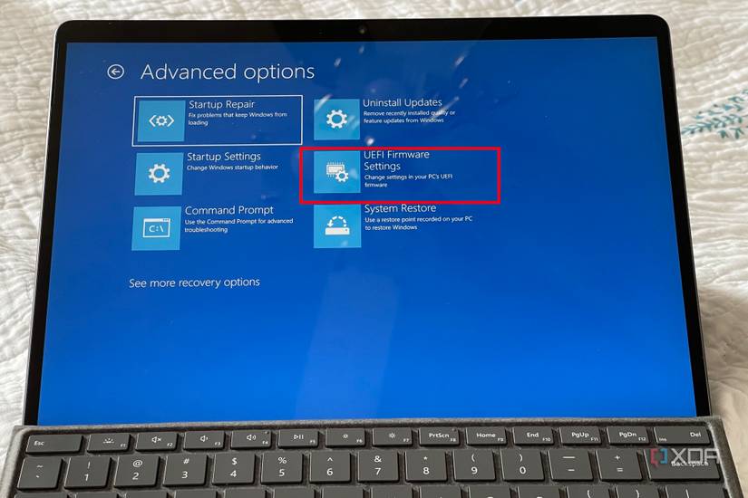 A photo of the Windows 11 Troubleshoot screen showing advanced UEFI options