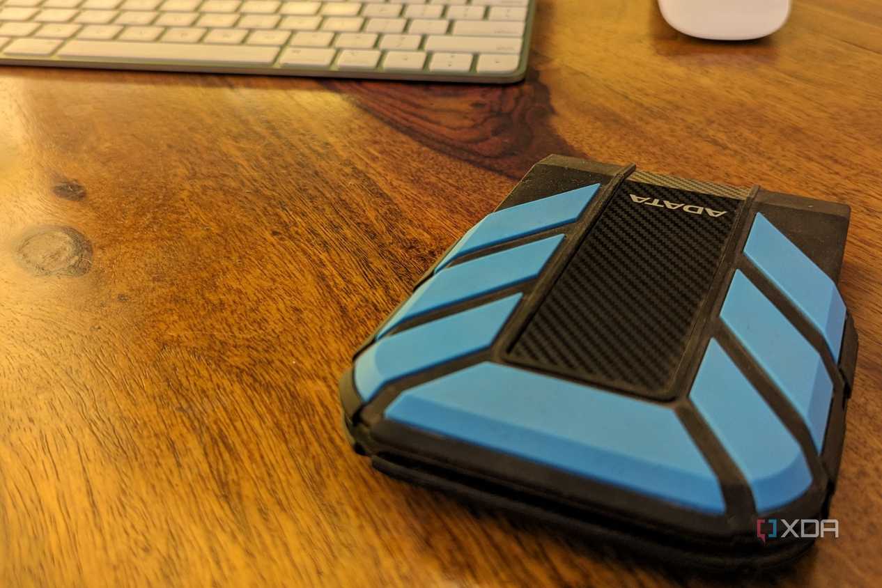 Adata HD710 Pro 2TB hard drive on a brown desk