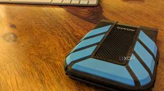 Adata HD710 Pro 2TB hard drive on a brown desk