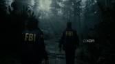 A screenshot showing a scene from Alan Wake 2 with some god rays.