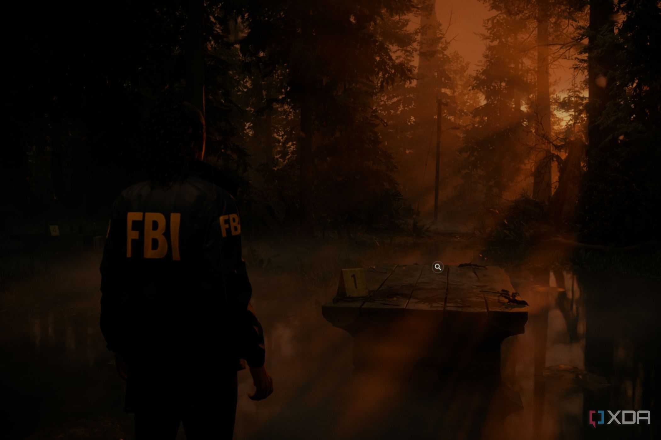 A screenshto showing sunrays peeking through tress in a forest in Alan Wake 2.