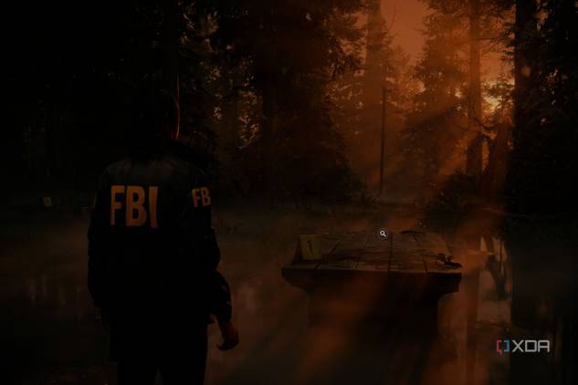 A screenshto showing sunrays peeking through tress in a forest in Alan Wake 2.