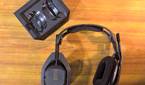 astro a50 (gen 4) on a table with its base station and one earpiece rotated