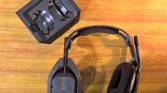 astro a50 (gen 4) on a table with its base station and one earpiece rotated