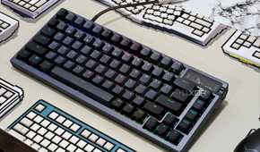 An image showing the ASUS ROG Azoth keyboard resting on a desk.