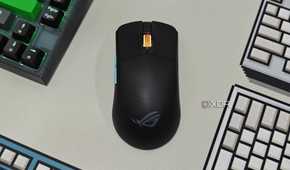 An image showing the ROG Harpe Ace Aim Lab Edition mouse kept on a deskmat.