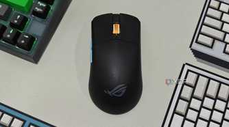 An image showing the ROG Harpe Ace Aim Lab Edition mouse kept on a deskmat.