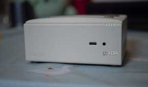Ayaneo Retro Mini PC with USB-C port and headphone jack showing on a table