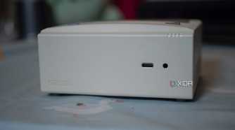 Ayaneo Retro Mini PC with USB-C port and headphone jack showing on a table