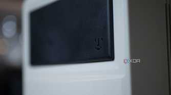 Smiley face from old Macintosh products on the front of the Ayaneo Retro Mini PC