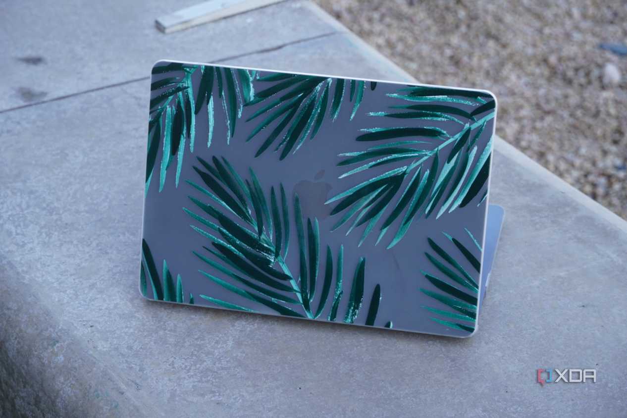 A MacBook with a Casetify Snap case opened.