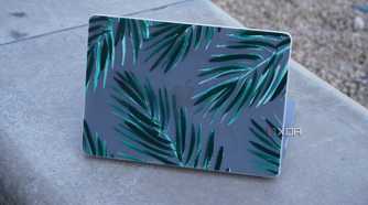 A MacBook with a Casetify Snap case opened.