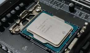An image showing an Intel processor resting on a motherboard socket.