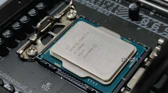 An image showing an Intel processor resting on a motherboard socket.