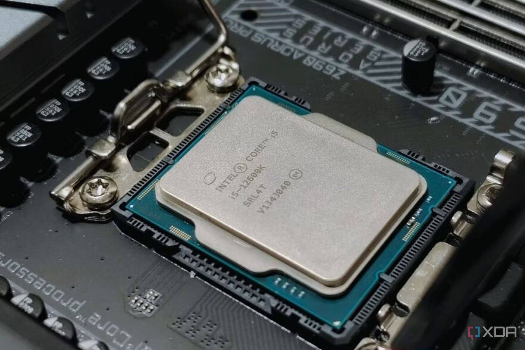 An image showing an Intel processor resting on a motherboard socket.