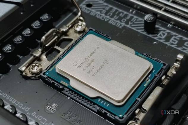An image showing an Intel processor resting on a motherboard socket.