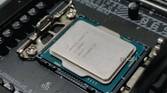 An image showing an Intel processor resting on a motherboard socket.