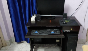 Black desktop PC setup with monitor and peripherals