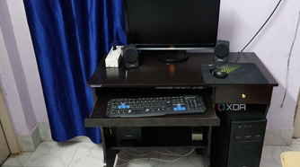 Black desktop PC setup with monitor and peripherals