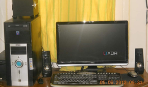 Black Desktop PC with black monitor and peripherals