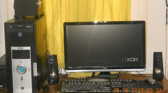 Black Desktop PC with black monitor and peripherals