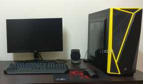 Black Gaming PC setup with monitor and keyboard mouse