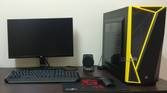 Black Gaming PC setup with monitor and keyboard mouse